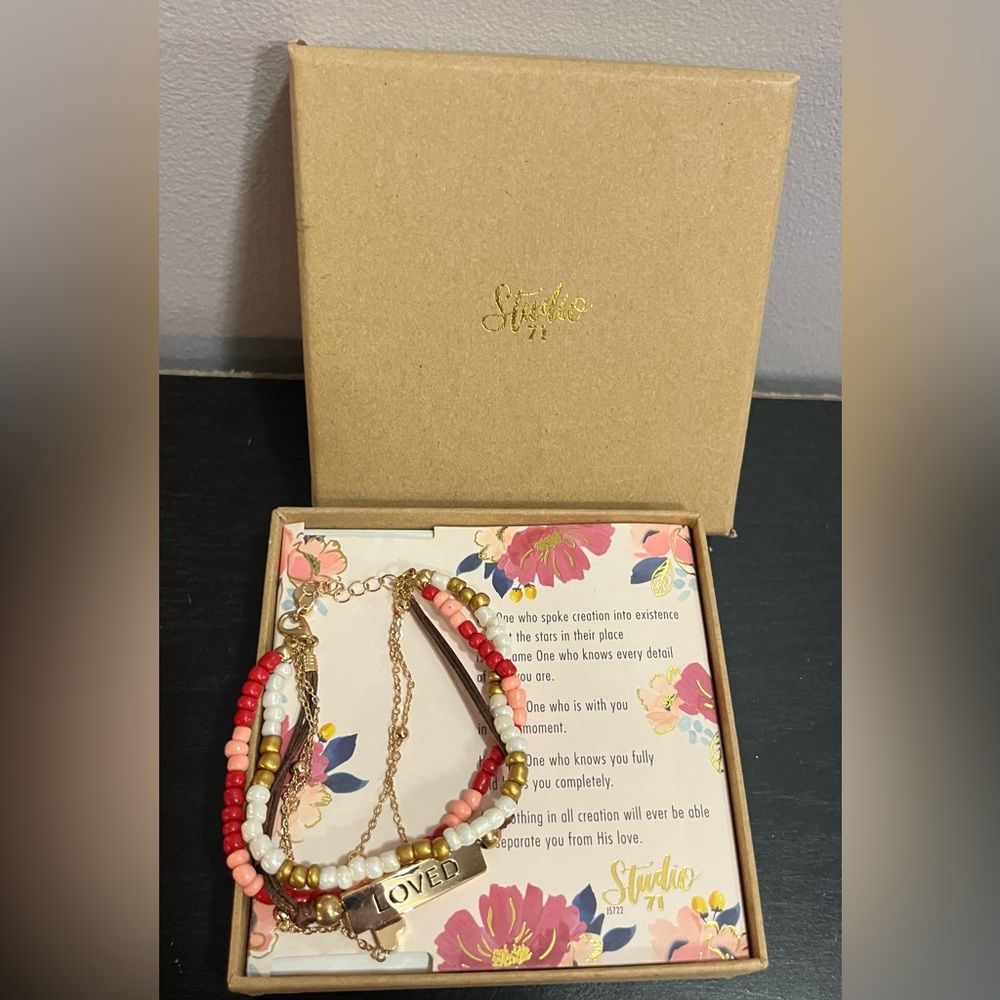 New Studio 71 multi-strand bracelet with gold-tone plate with the word "LOVED".